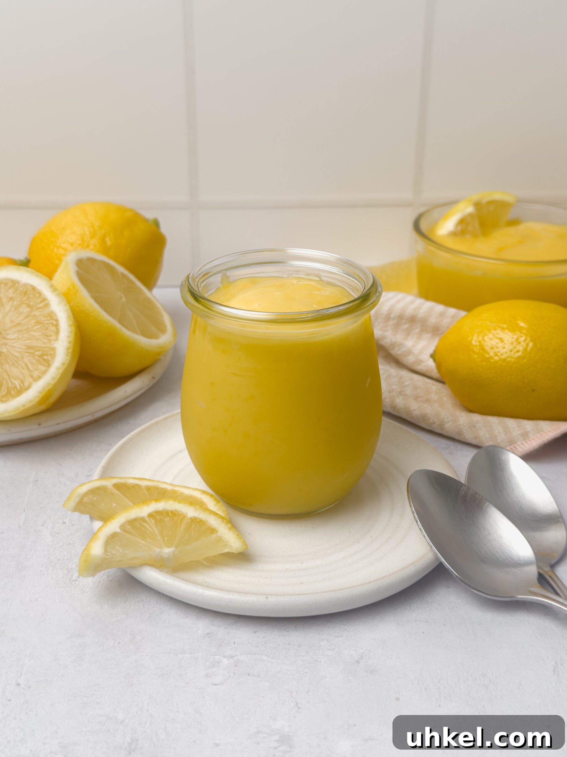 Lemon Curd Recipe: Smooth, Zesty Homemade Spread 7 Lemon curd on spoon and jar