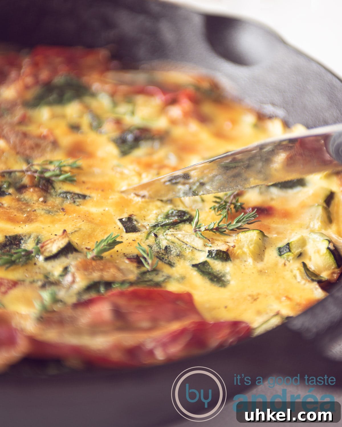 Zucchini and Spinach Frittata Recipe: Quick Savory Breakfast 3 a pan with a frittata with spinach and zucchini