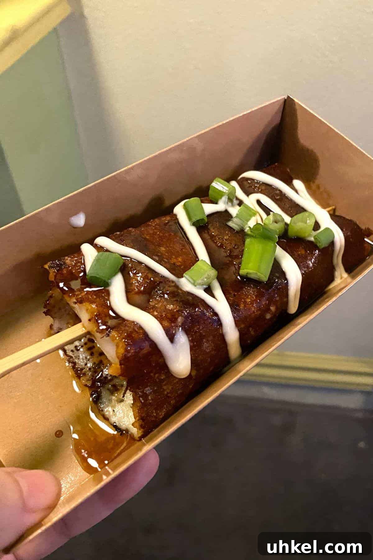 Epic Universe Food Guide: What We’ve Tried and Where to Eat 8 Tteokbokki Skewer