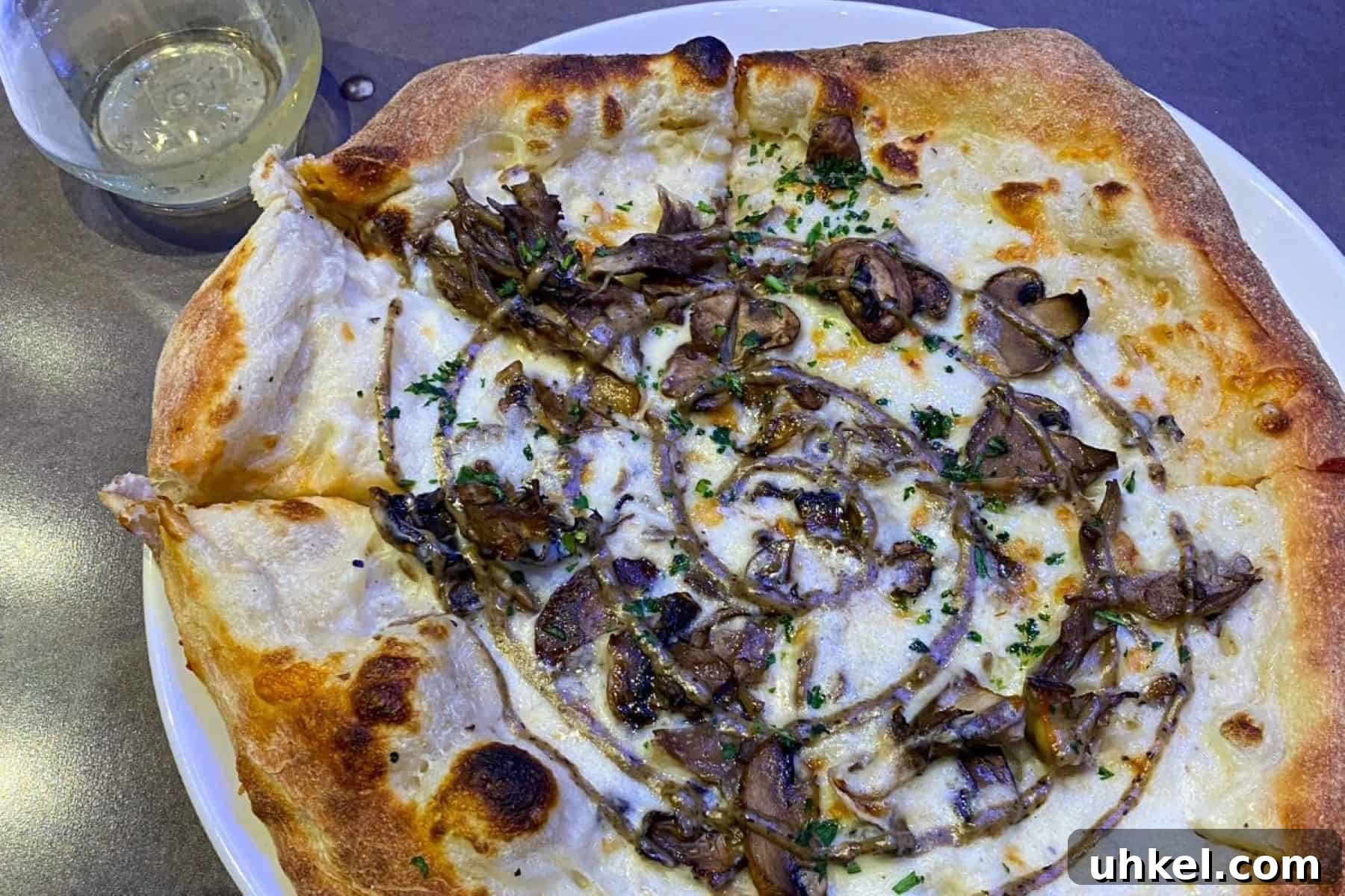 Epic Universe Food Guide: What We’ve Tried and Where to Eat 10 epic universe pizza moon giant mushroom pizza