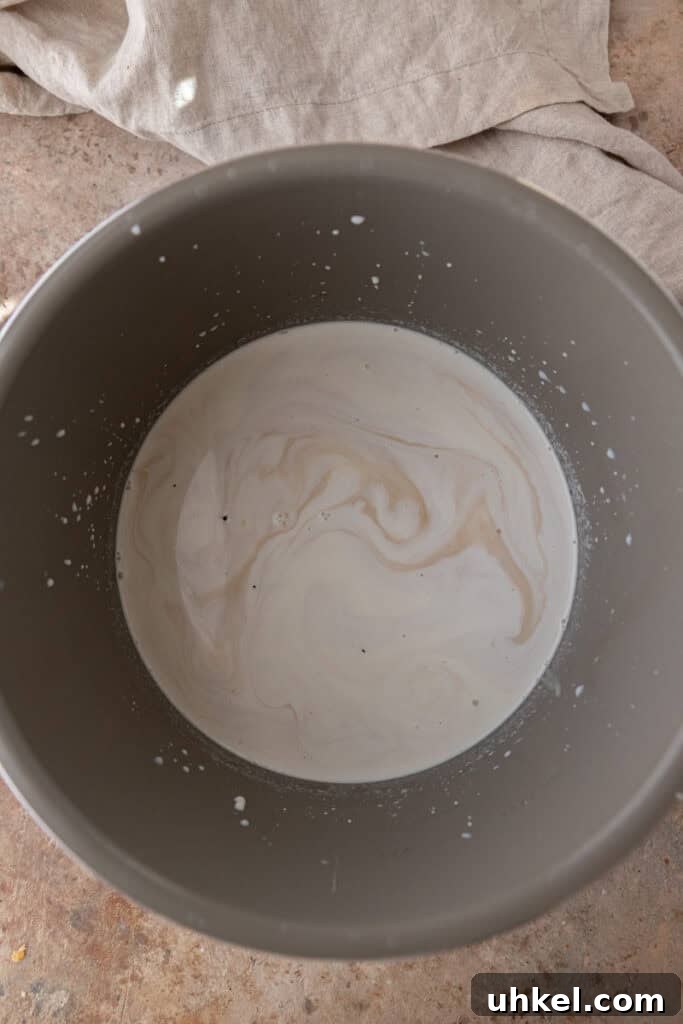 Milk and cream mixture in a slow cooker.