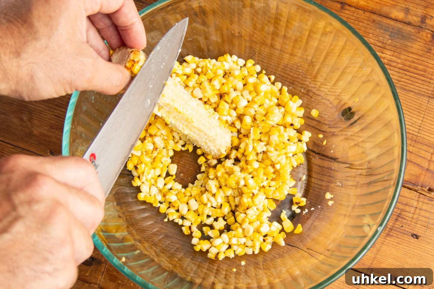 Fresh Corn Pico de Gallo with Cilantro & Lime 5 This is a picture of the corn being cut off the cob.