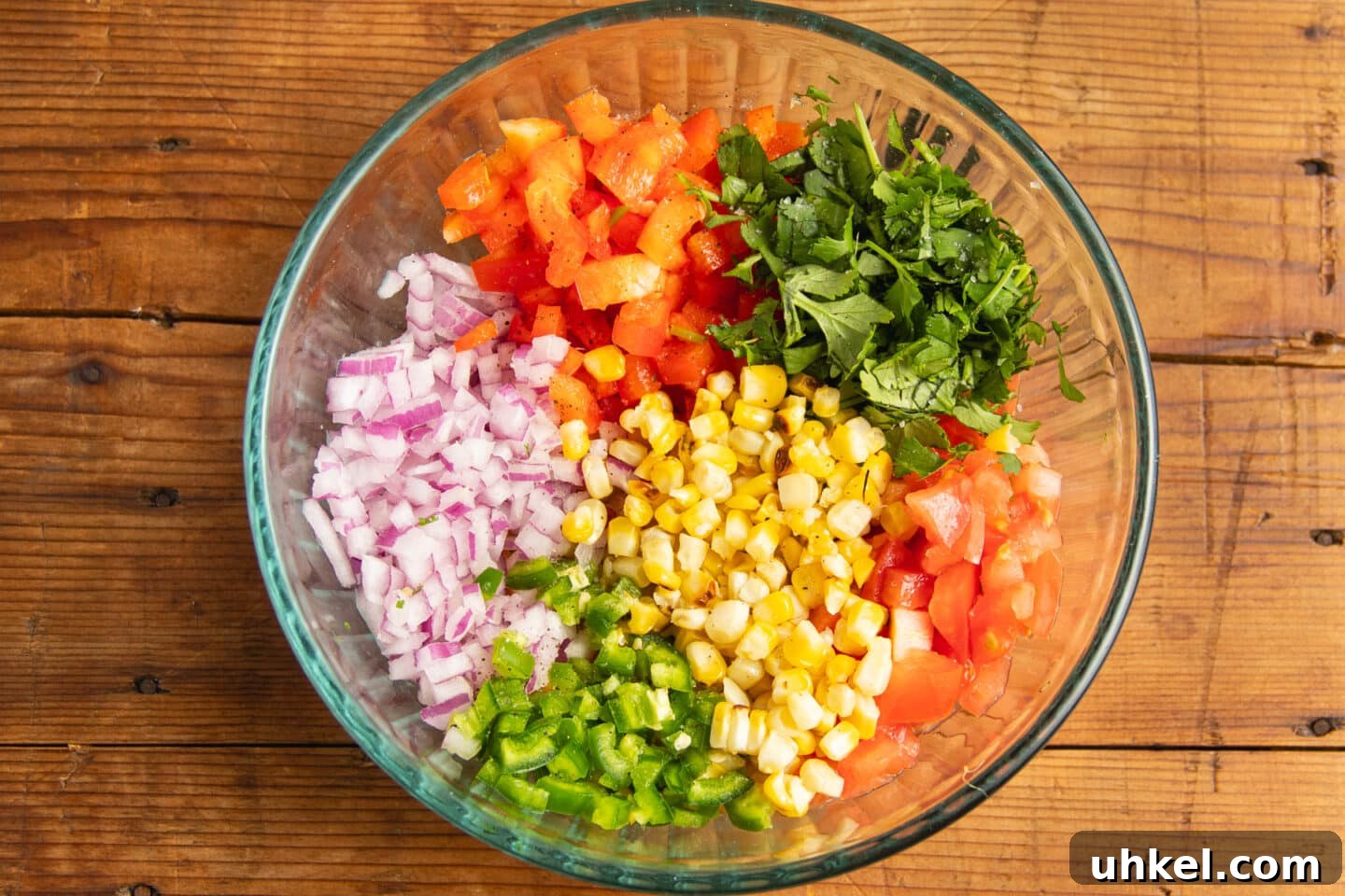Fresh Corn Pico de Gallo with Cilantro & Lime 6 This is a picture of the ingredients chopped up in a bowl.