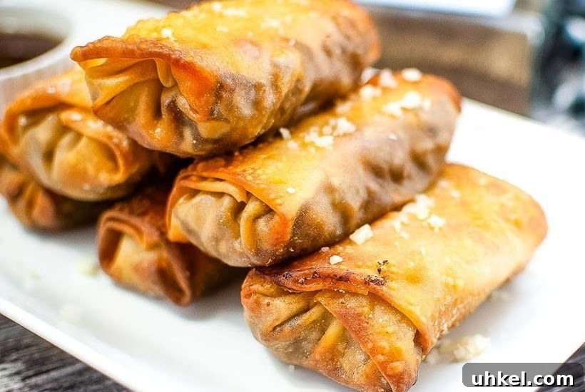 Air Fryer Cheesesteak Egg Rolls (Oven-Baked Option) 4 front close up view of cheesesteak egg rolls air fryer.