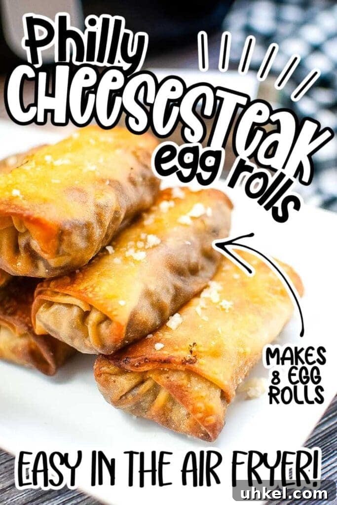 Air Fryer Cheesesteak Egg Rolls (Oven-Baked Option) 5 a stack of air fryer cheesesteak egg rolls on a white plate with text overlay.