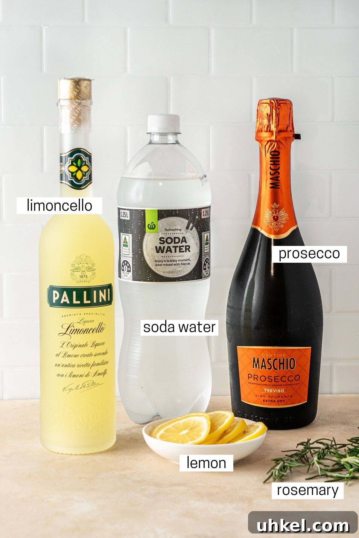 All ingredients needed to make a limoncello spritz. 
