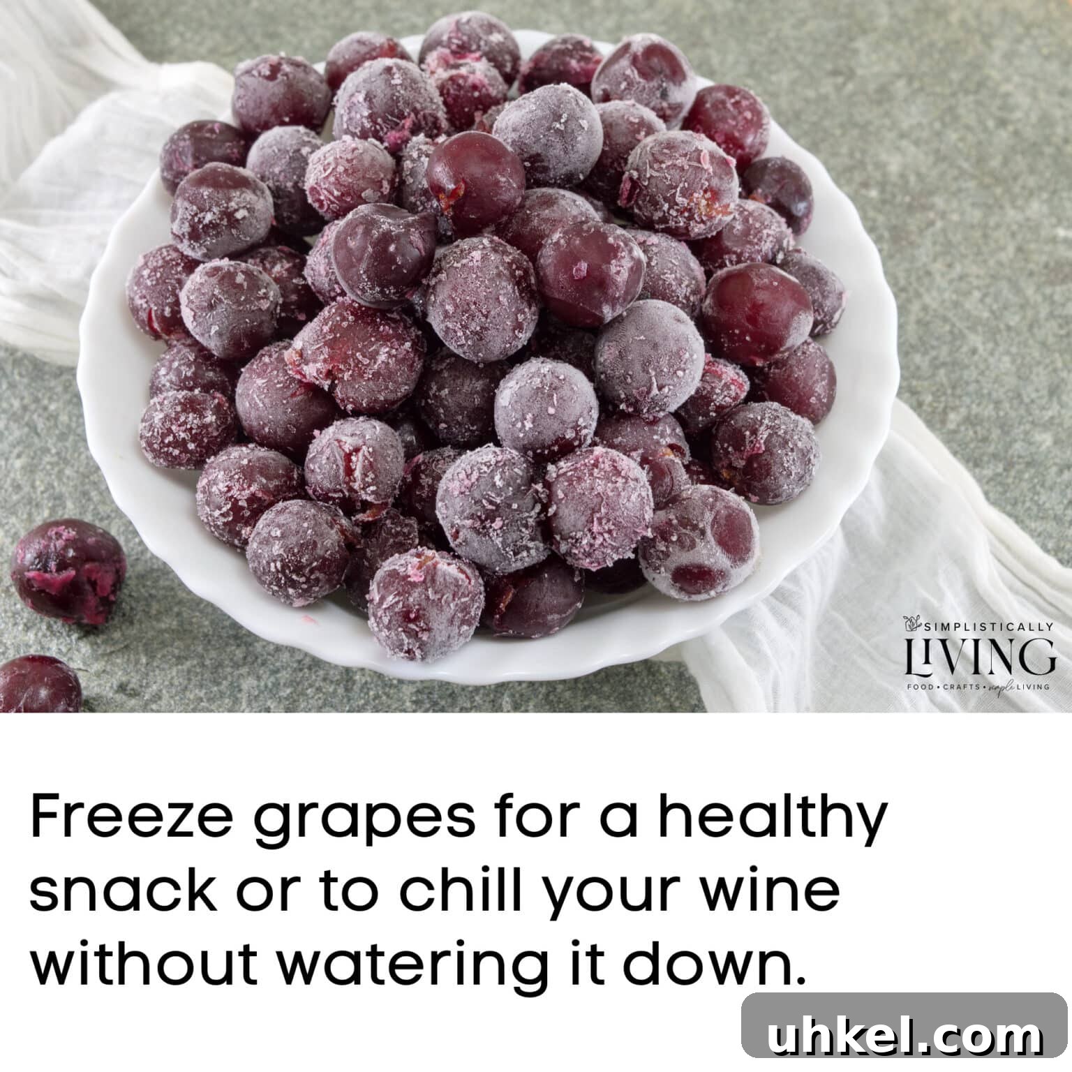 a plate of frozen grapes with meme that says "freeze grapes for a healthy snack or to chill your wine without watering it down".