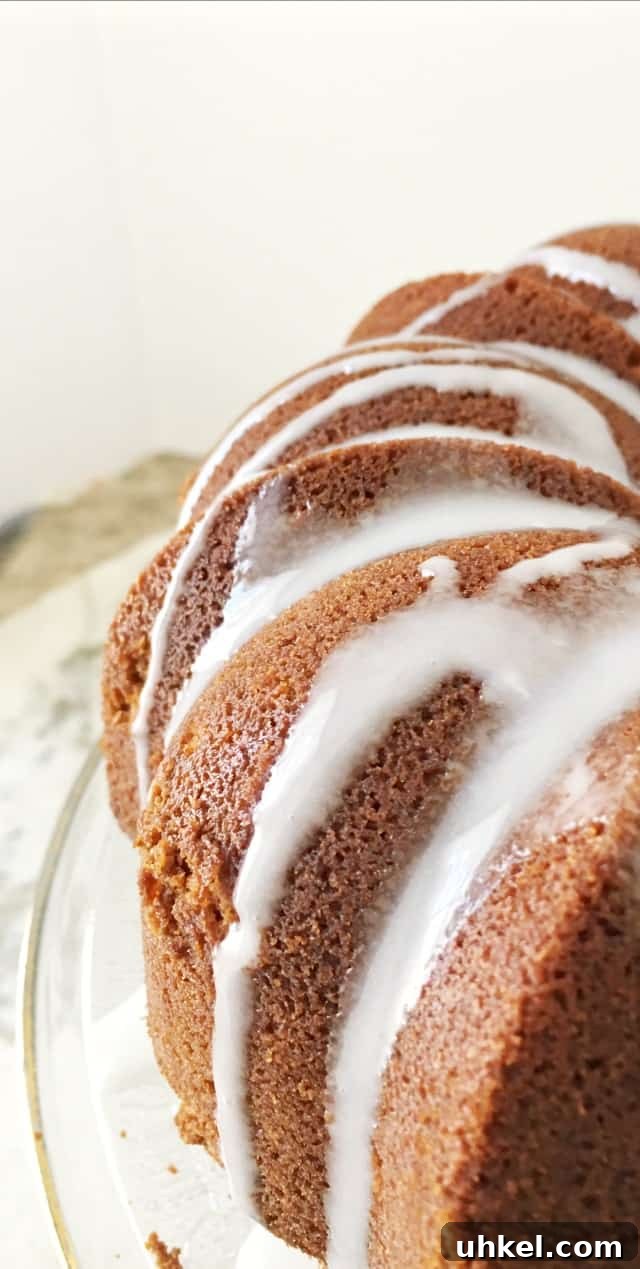 How to Make Glossy Cake Glaze for Shiny, Smooth Cakes 5 The side of the cake with glaze dripping down