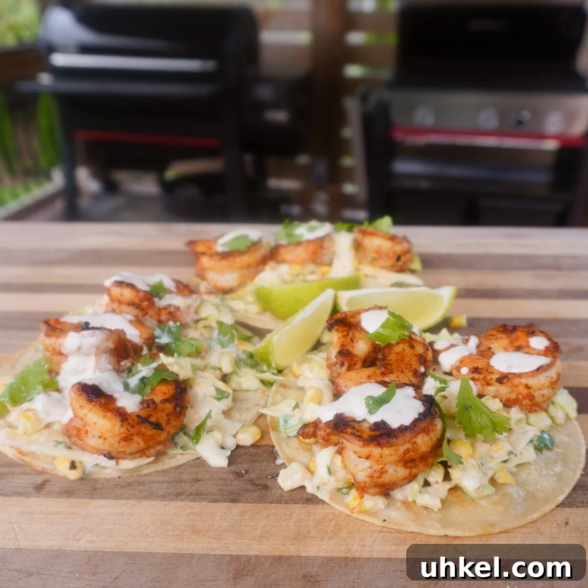 Grilled Shrimp Tacos with Zesty Corn Slaw 9 3 grilled shrimp with corn slaw tacos on cutting board