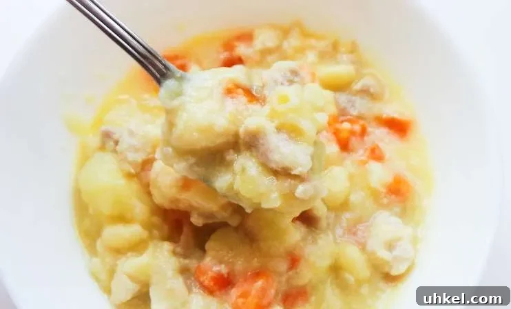 Easy homemade chicken soup with noodles! This tasty thick chicken soup is loved by kids and grown-ups! 7 simple ingredients, one pot and and 20 minutes! Perfect for lunch or dinner.