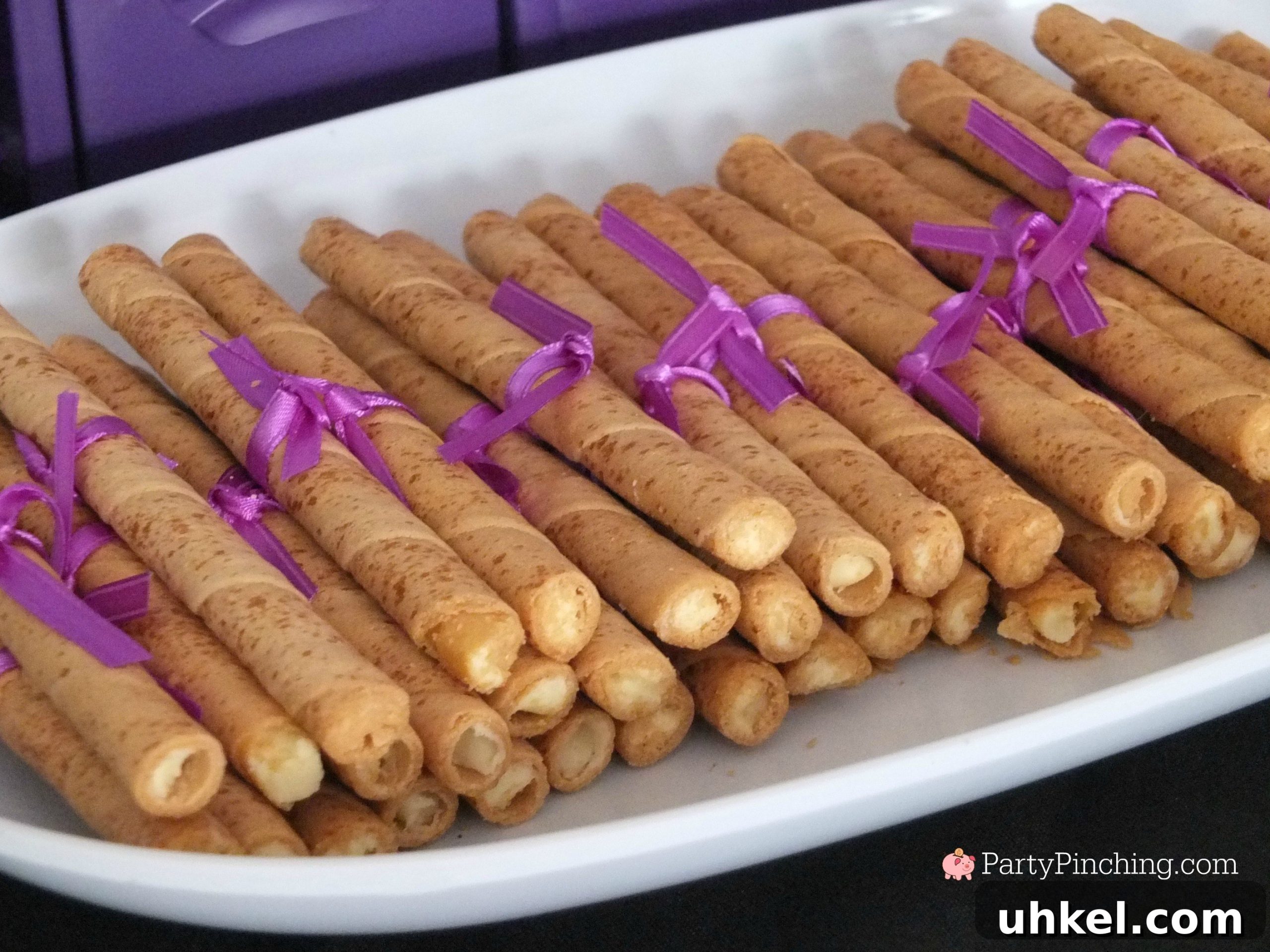 Art-Themed Graduation Party Ideas and Decor 7 mini paint can favors