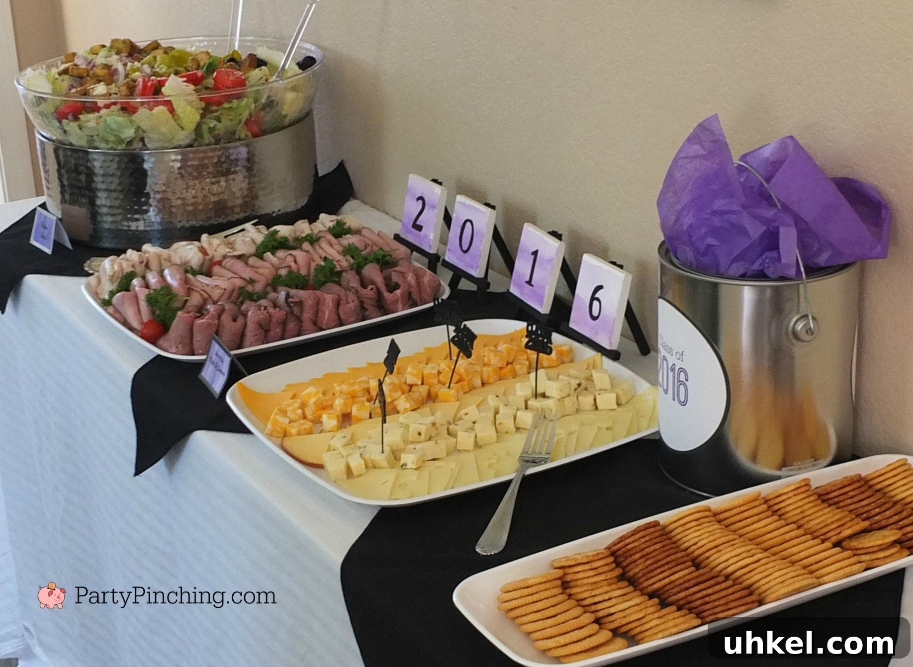 Art-Themed Graduation Party Ideas and Decor 10 paint cans filled with chips