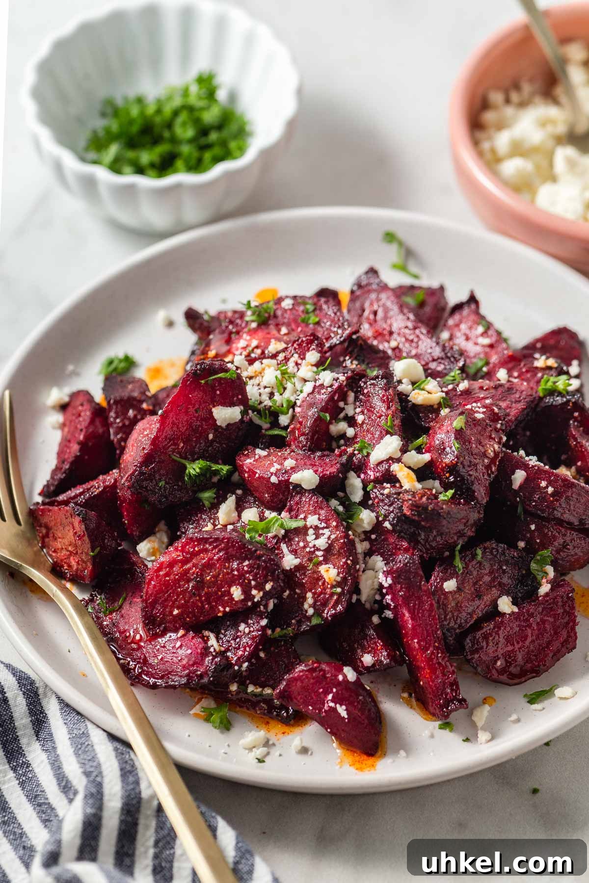 Air Fryer Roasted Beets with Crispy Edges 2 air fryer beets with feta on a plate.
