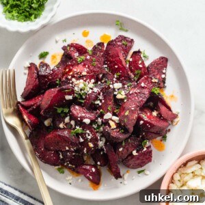 Air Fryer Roasted Beets with Crispy Edges 10 air fryer roasted beets on a plate.