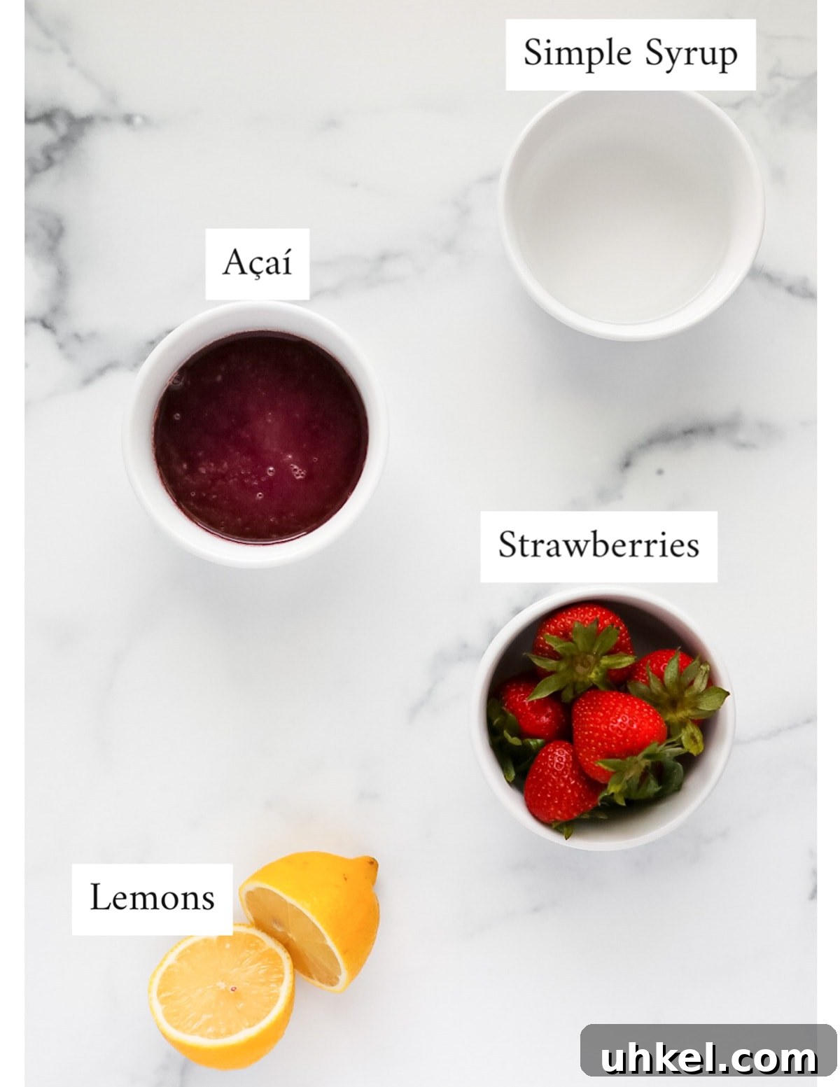 Homemade Strawberry Acai Lemonade 3 Labeled ingredients including: simple syrup, acai, strawberries, lemons