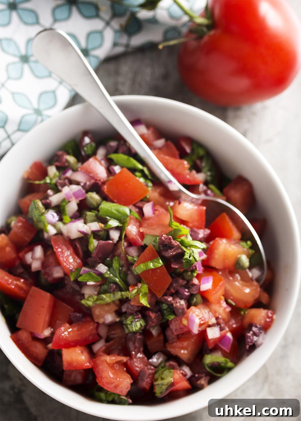 Italian Tomato, Olive and Caper Salsa Recipe 4 Italian salsa in a bowl with herbs