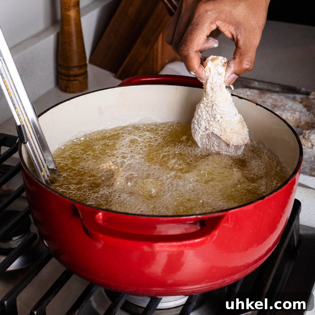 Crispy Fried Chicken Without Buttermilk 10 frying chicken in a dutch oven